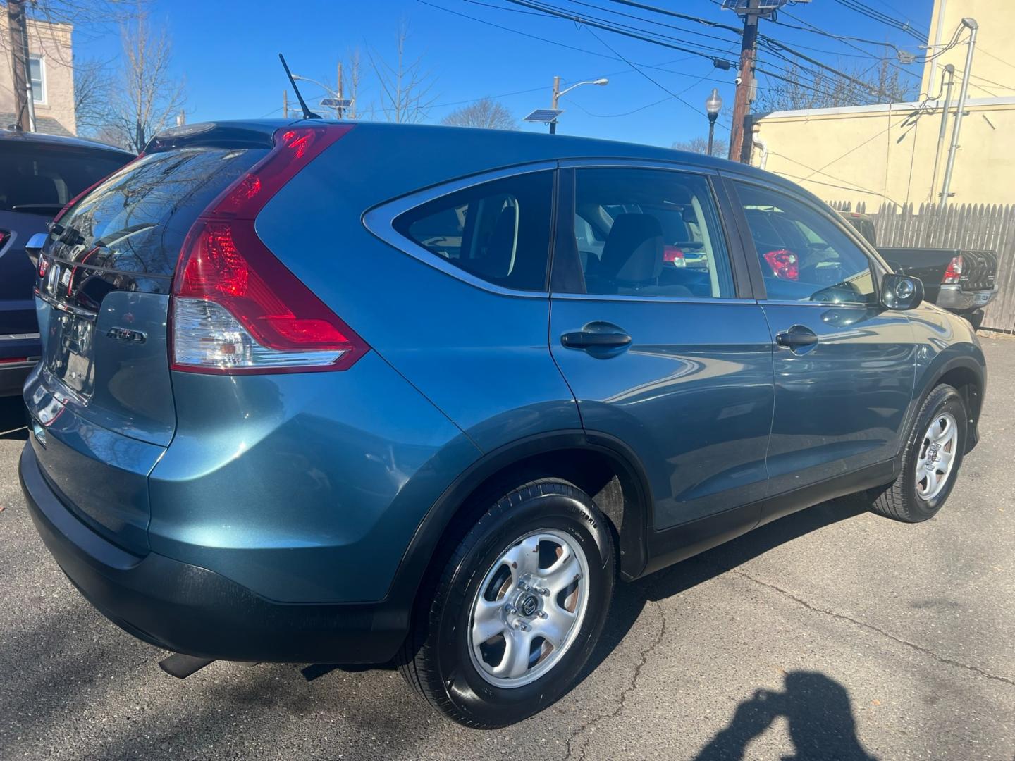 2013 Teal /Gray Honda CR-V LX 4WD 5 Speed AT (5J6RM4H33DL) with an 2.4L L4 DOHC 16V engine, 5 Speed Automatic transmission, located at 1018 Brunswick Ave, Trenton, NJ, 08638, (609) 989-0900, 40.240086, -74.748085 - Photo#3